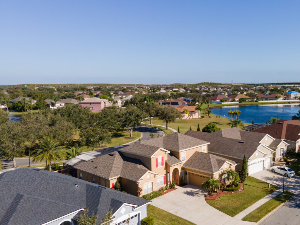 Falcon Trace single-family homes with a lake in the background